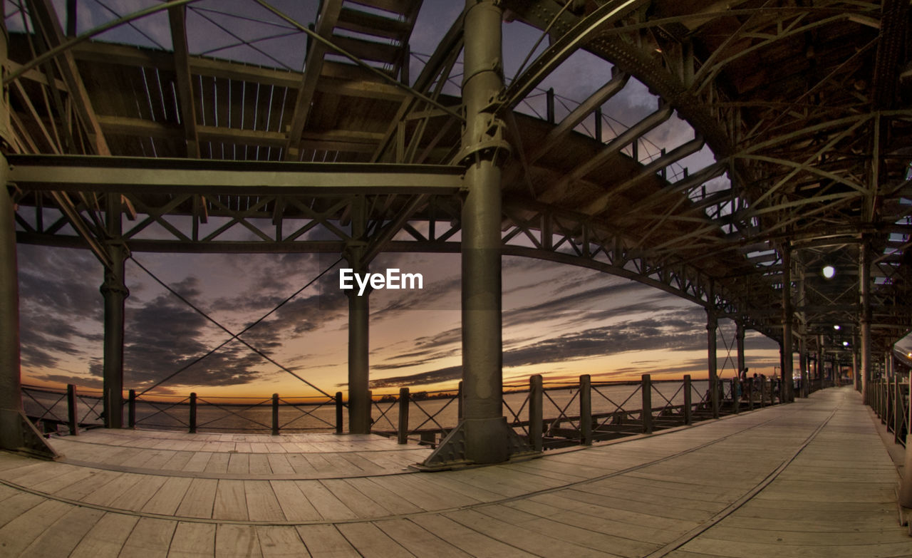 VIEW OF BRIDGE AGAINST SKY AT RAILWAY STATION