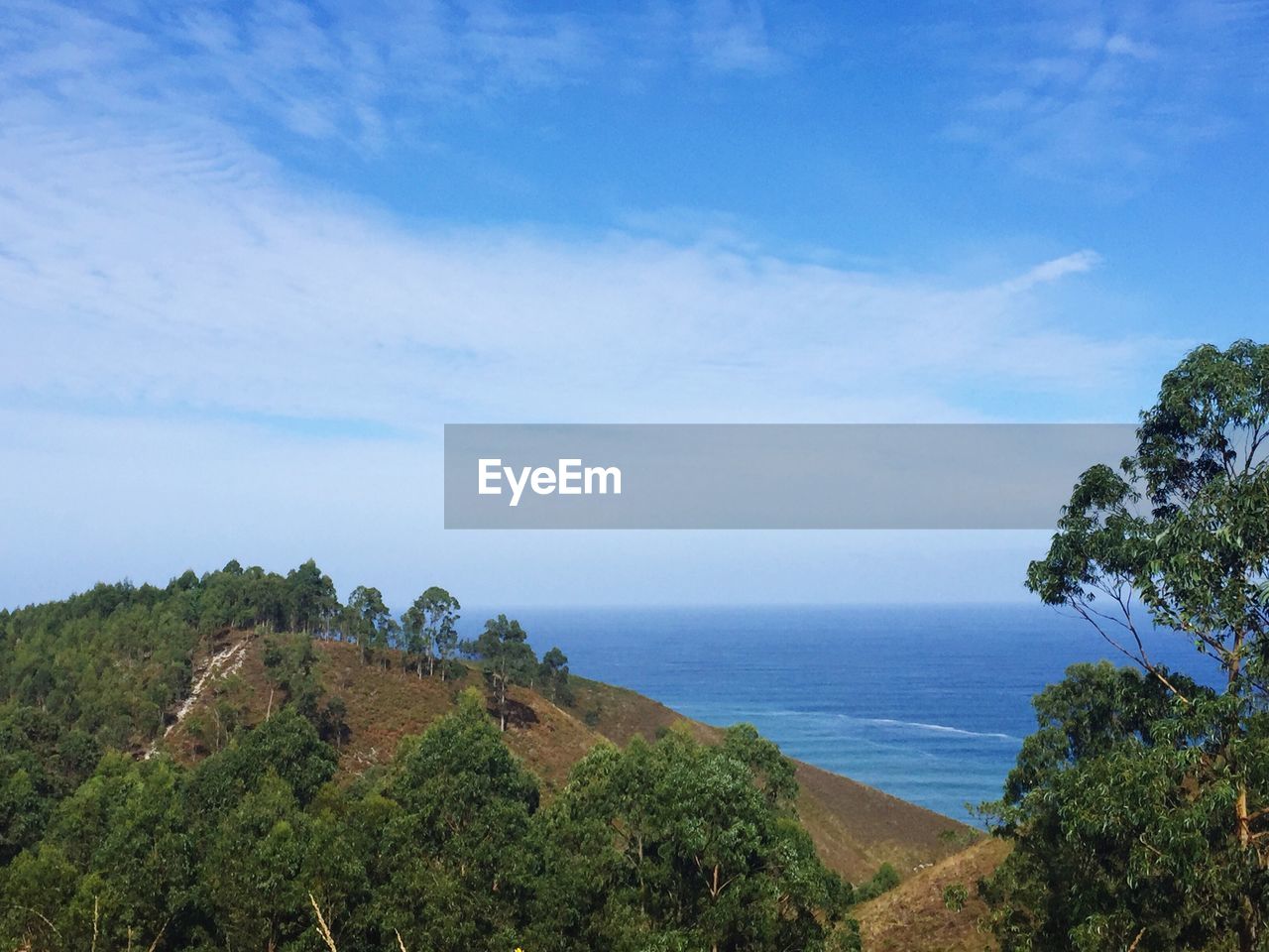 Scenic view of calm sea against sky