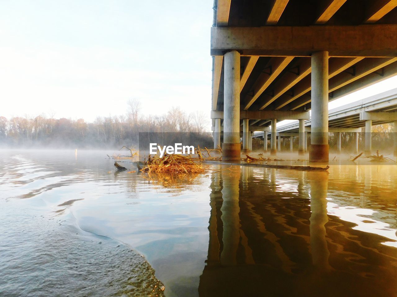 water, nature, lake, reflection, no people, outdoors, beauty in nature, tranquility, day, built structure, architecture, scenics, sky, tree, underneath