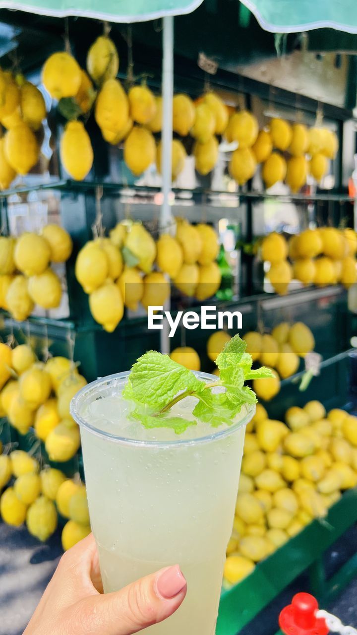 Close-up of lemon fruits and lemonade 