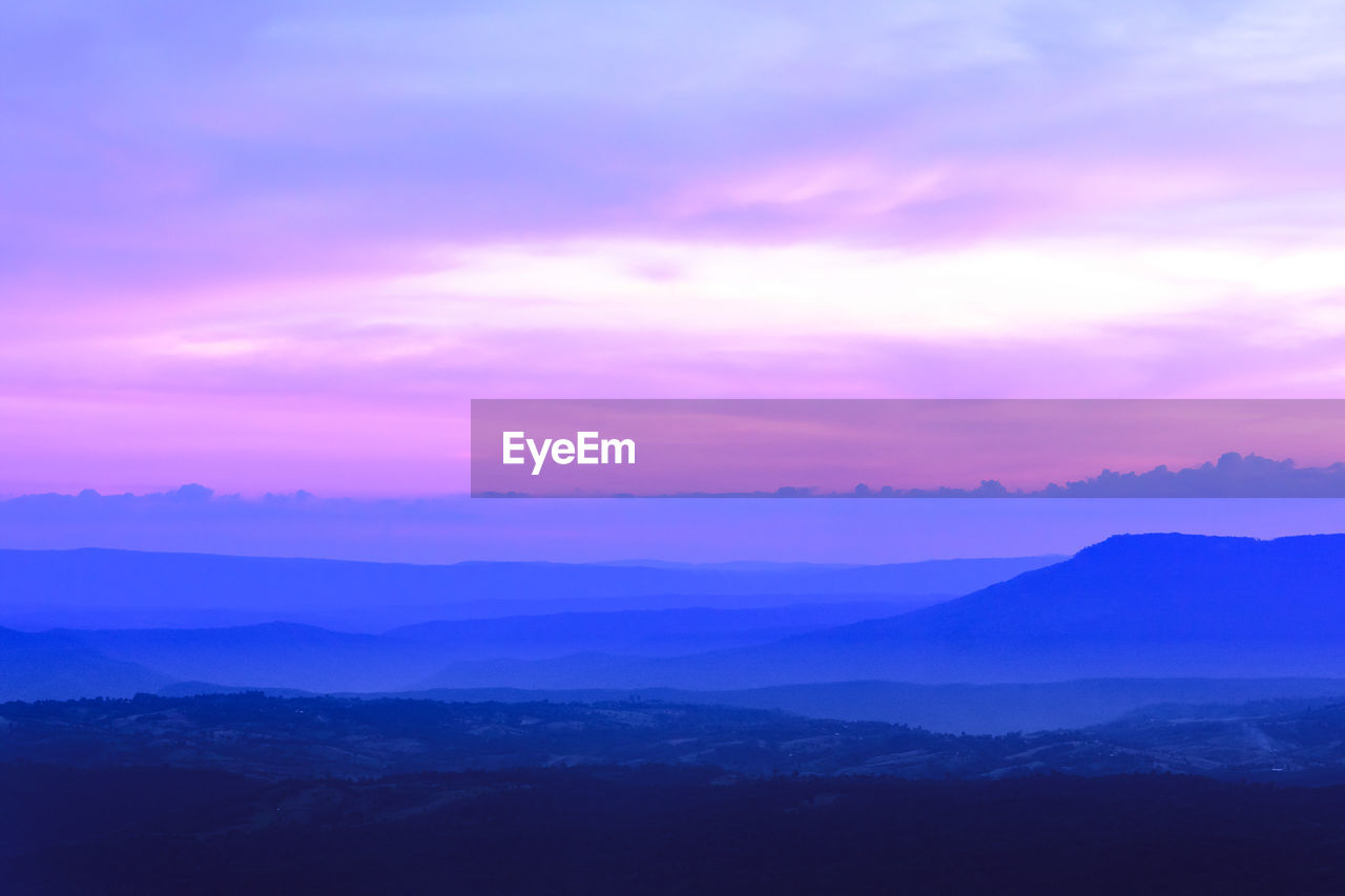 SCENIC VIEW OF DRAMATIC SKY OVER SILHOUETTE LANDSCAPE