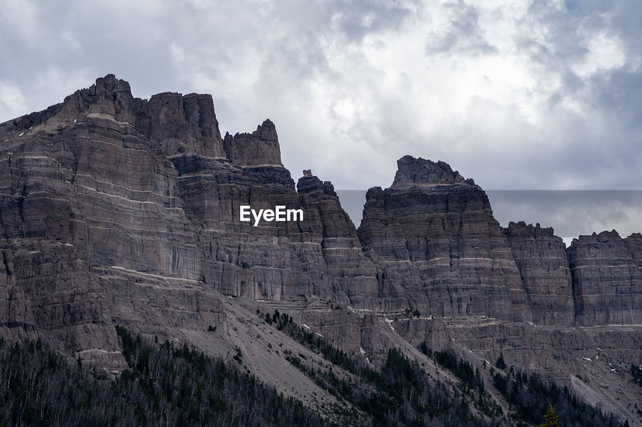 LOW ANGLE VIEW OF ROCK FORMATIONS