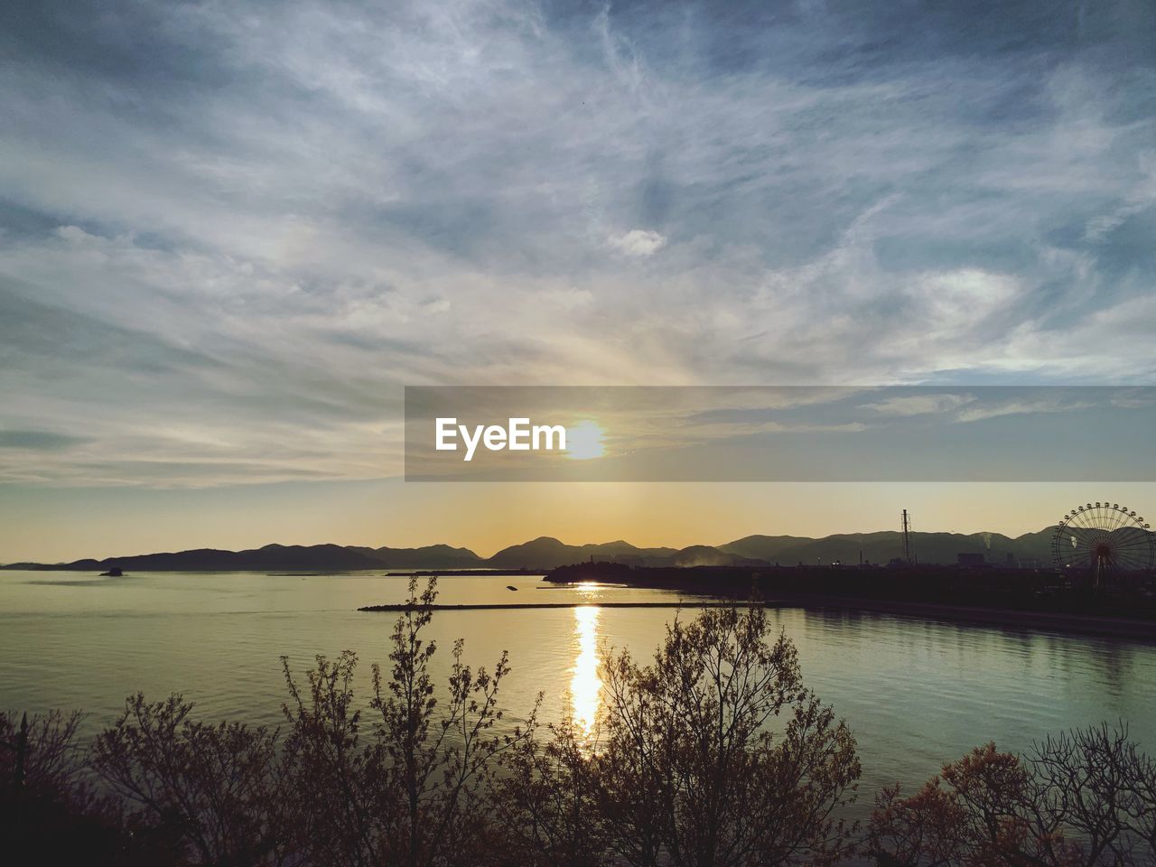 LAKE AGAINST SKY DURING SUNSET