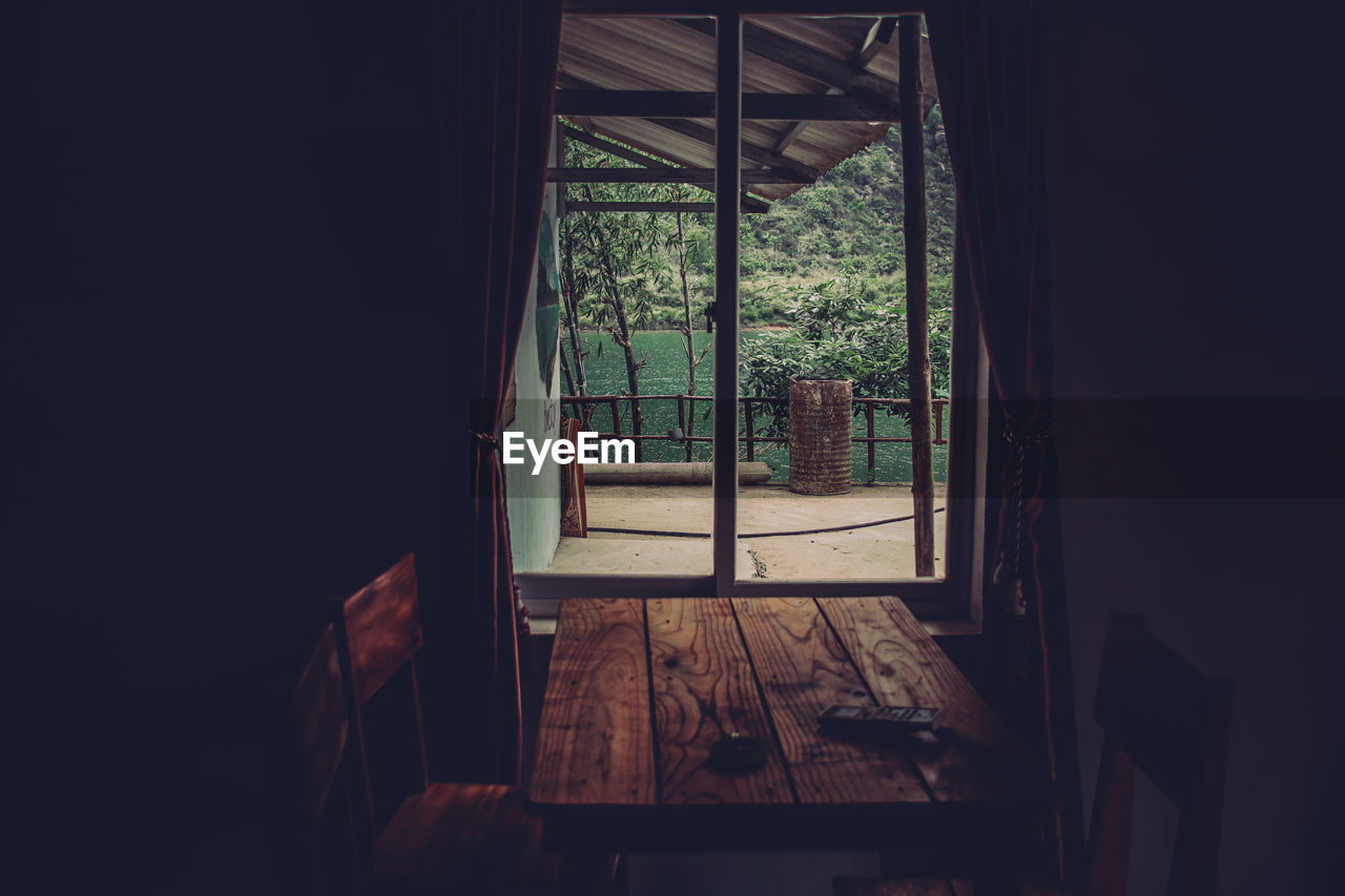 View of the phong nha river from a rustic wooden cabin