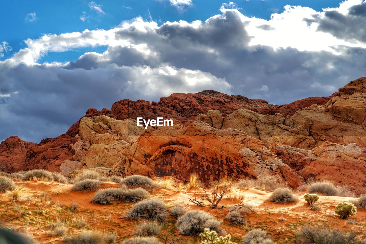 Rock formations on landscape against sky