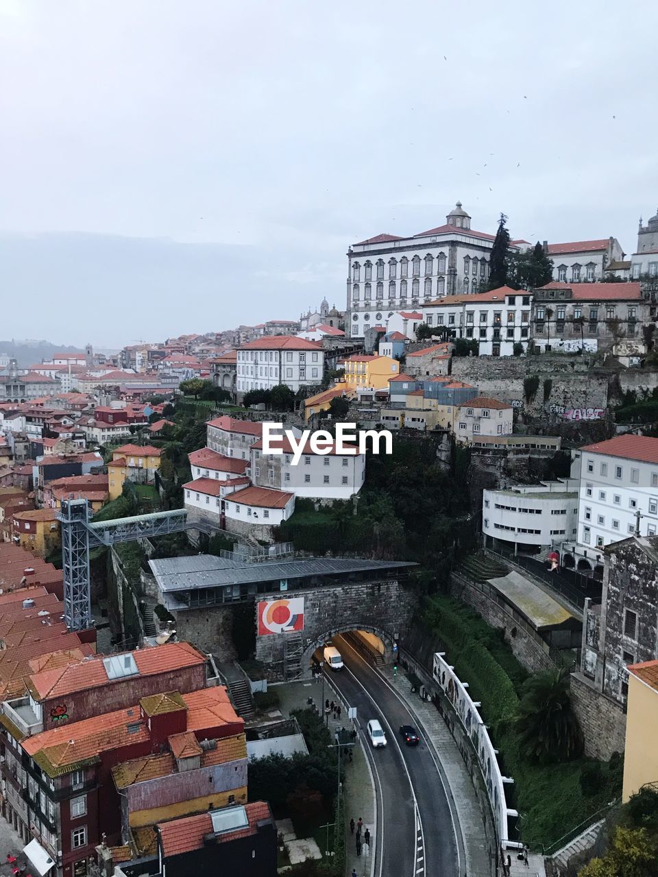 High angle view of buildings in city against sky