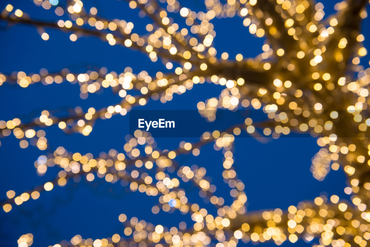 Defocused image of illuminated christmas lights