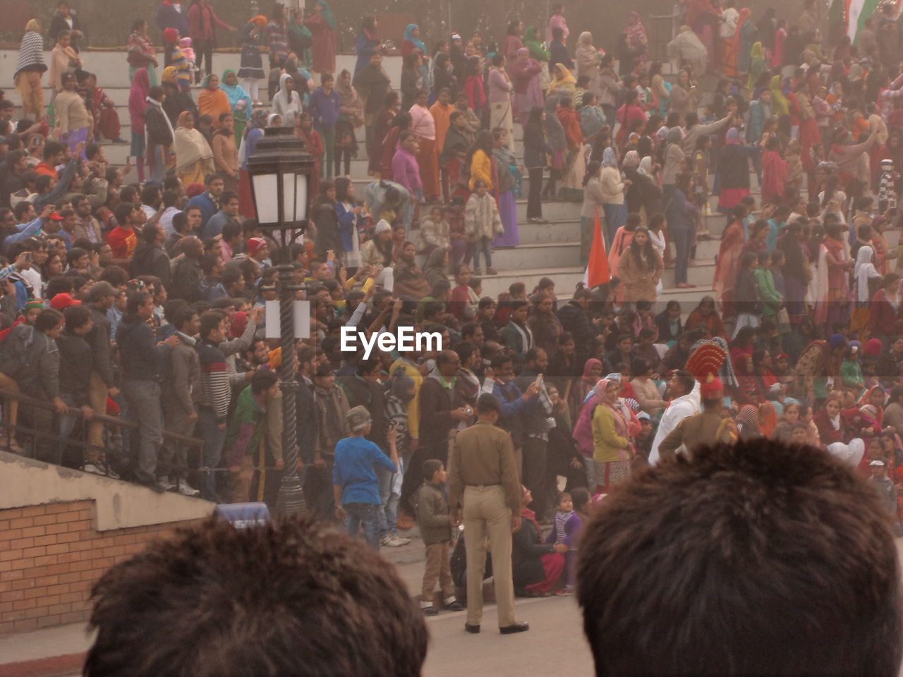 HIGH ANGLE VIEW OF CROWD IN THE MARKET