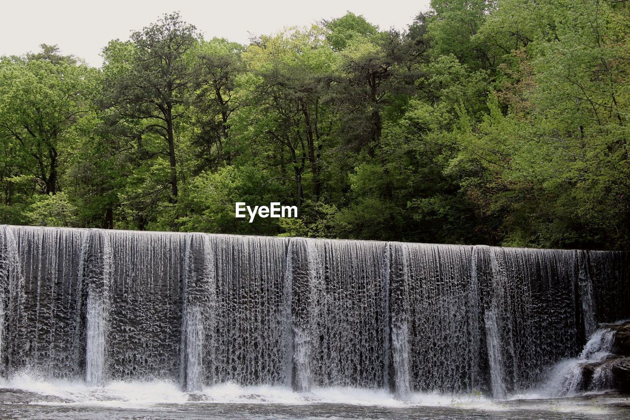 Full frame shot of waterfall in forest