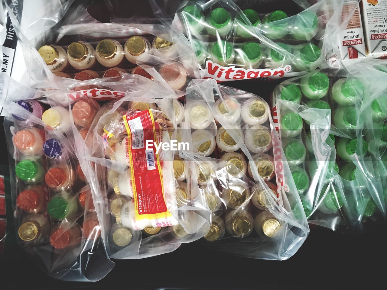 HIGH ANGLE VIEW OF VEGETABLES IN PLASTIC