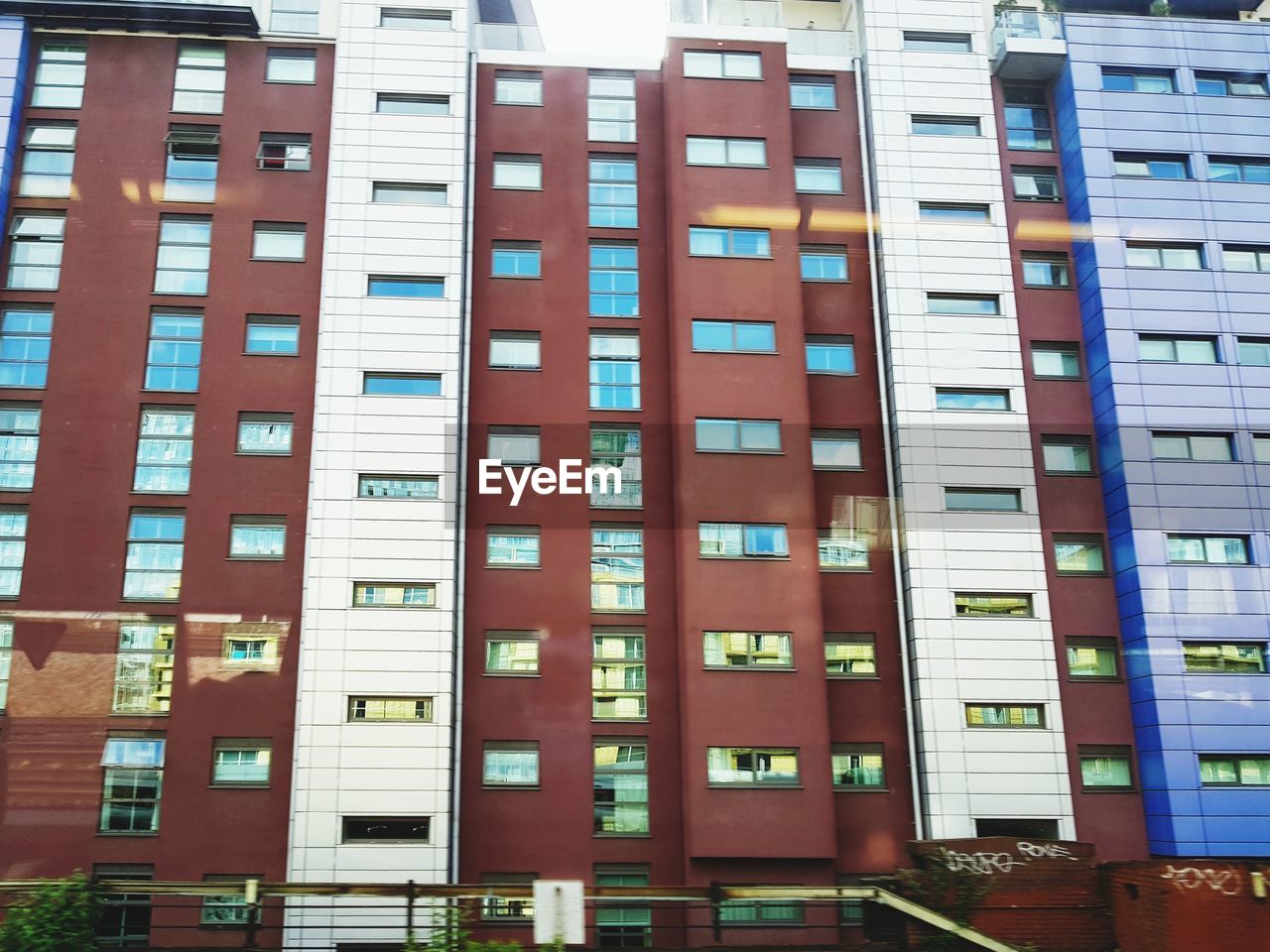 LOW ANGLE VIEW OF RESIDENTIAL BUILDING