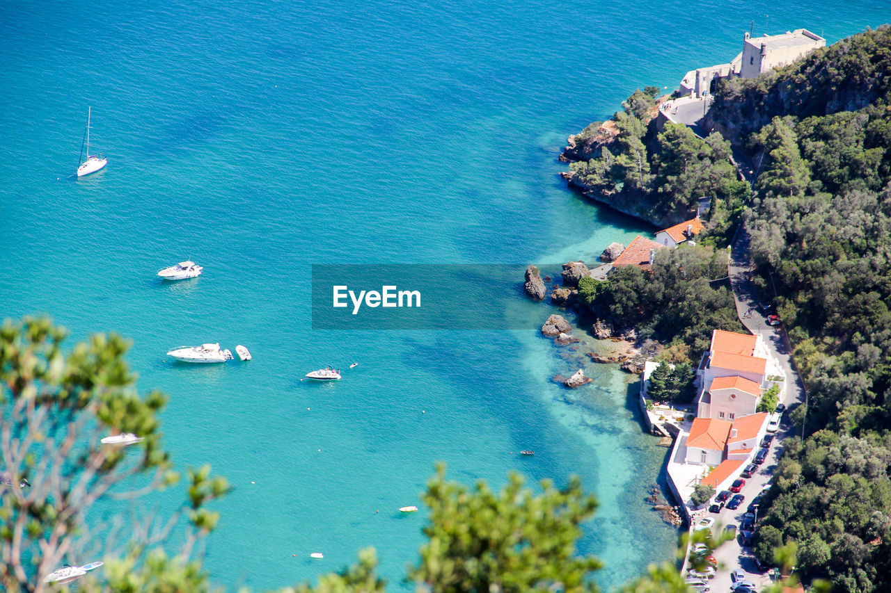 High angle view of sailboats on sea