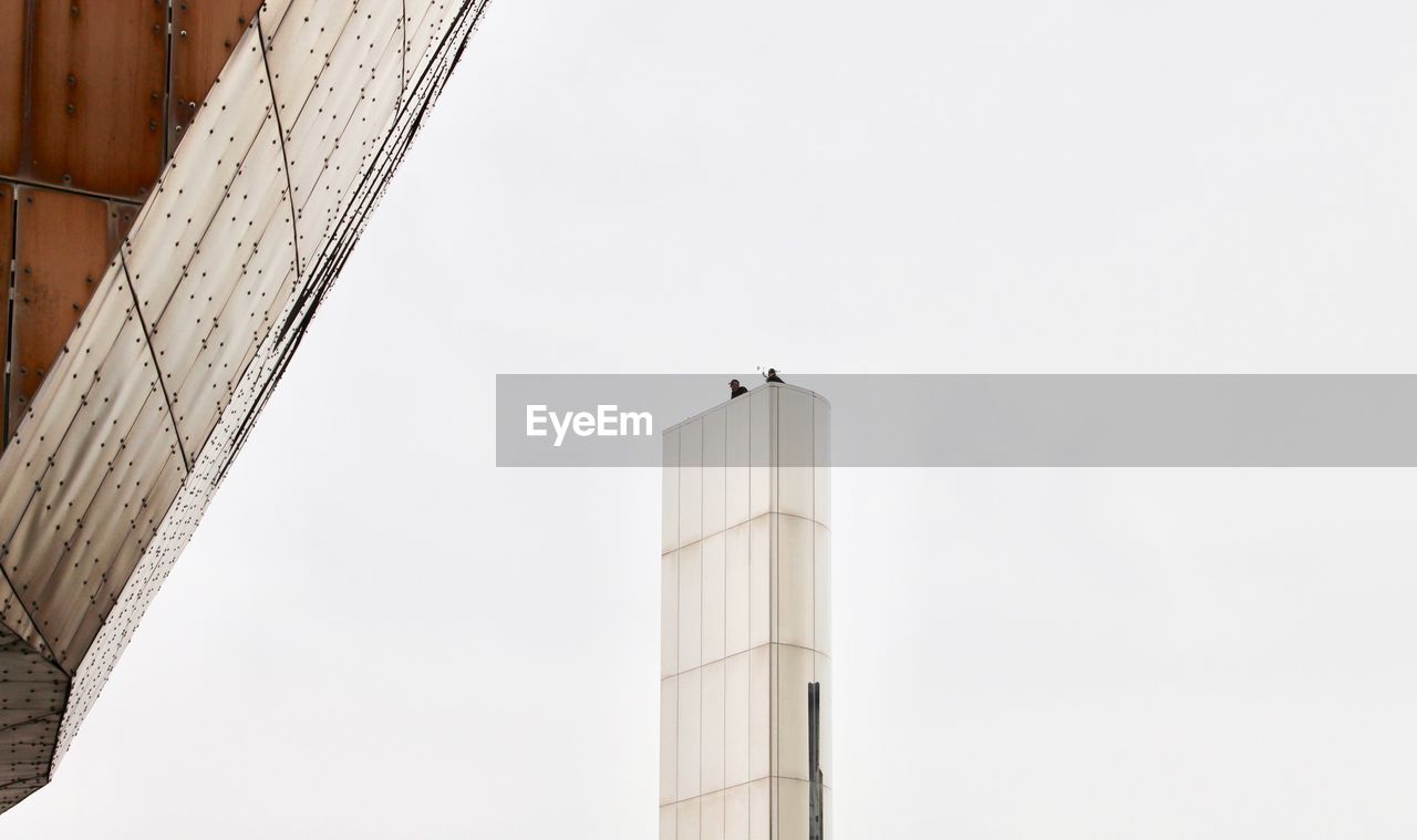 Low angle view of modern building against sky