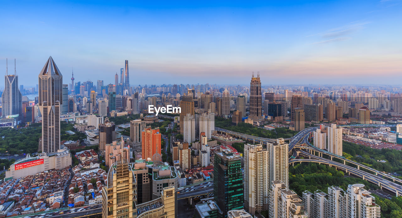 High angle view of cityscape against sky during sunset