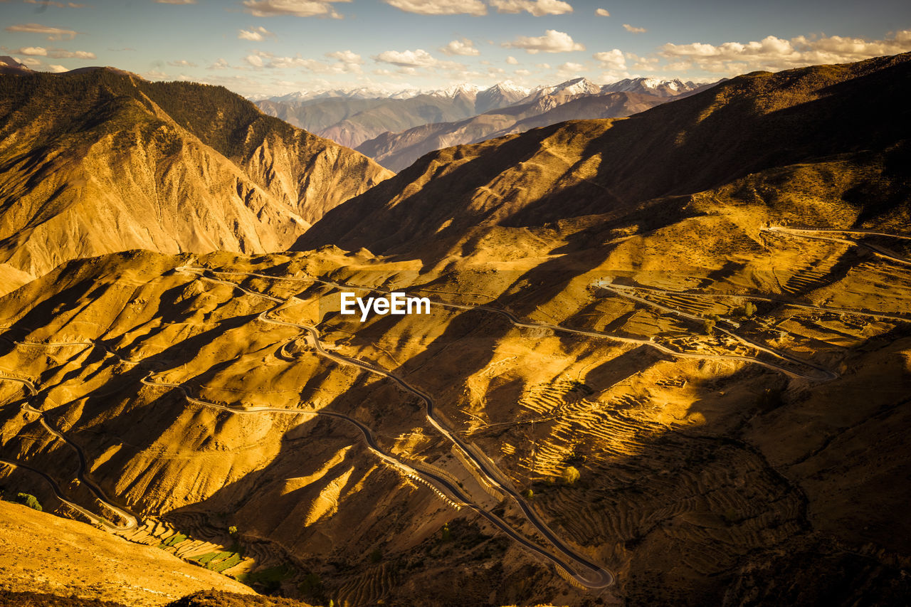 Road winding through mountain in tibet china.