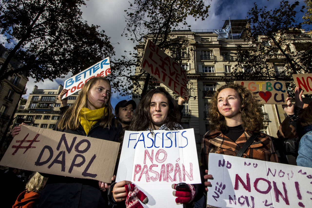 protest, crowd, text, group of people, communication, protestor, women, adult, architecture, education, western script, city, placard, handwriting, emotion, person, young adult, banner, clothing, outdoors, sign