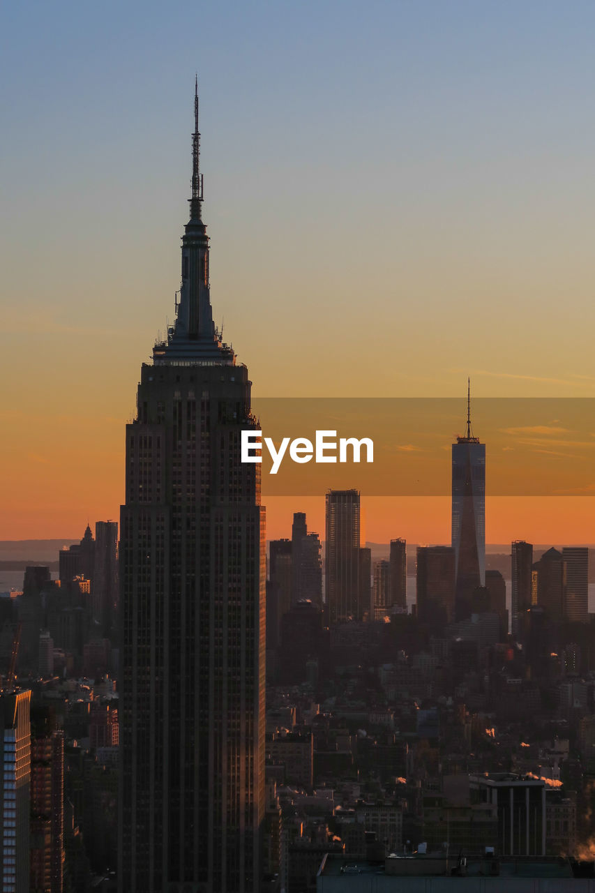 View of cityscape against sky during sunset