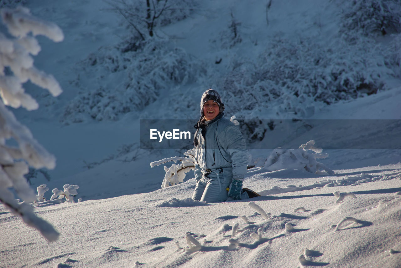 Person on snow covered land