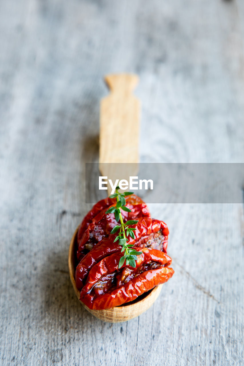 food and drink, food, wood, healthy eating, red, freshness, wellbeing, fruit, studio shot, plant, no people, indoors, produce, vegetable, high angle view, spice, fashion accessory, still life, table, jewellery, close-up