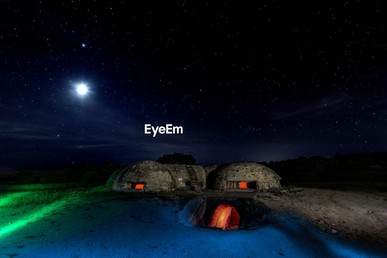 Scenic view of illuminated star field against sky at night