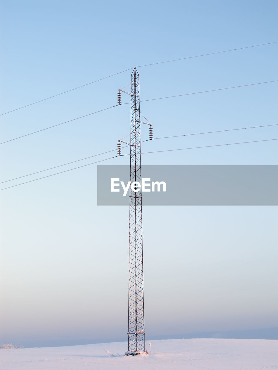 low angle view of electricity pylon against sky