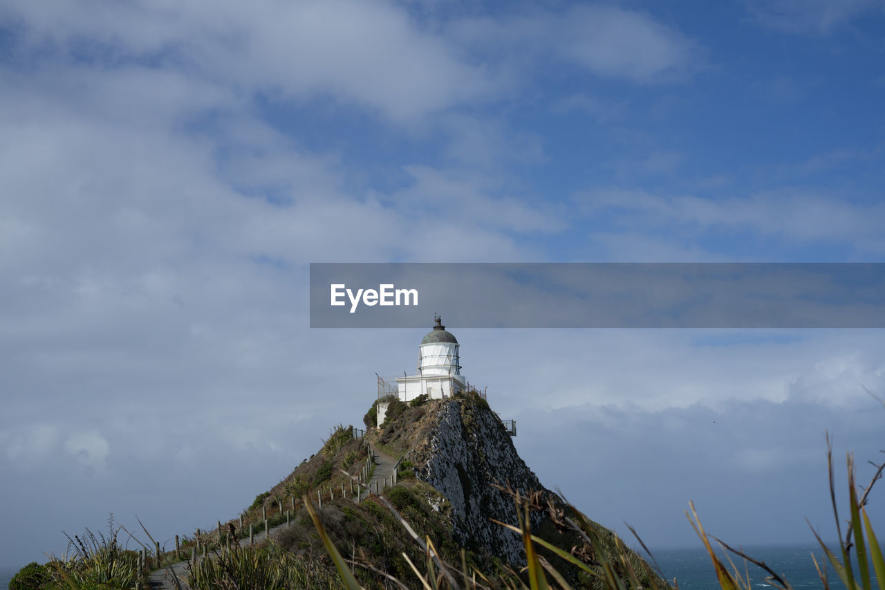 The iconic and historical nugget point light house in new zealand.