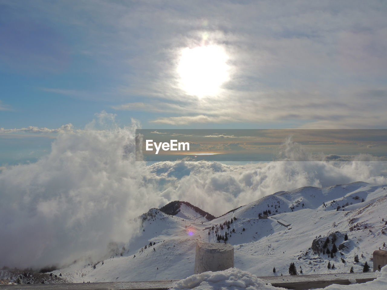 Scenic view of snow against sky during sunset