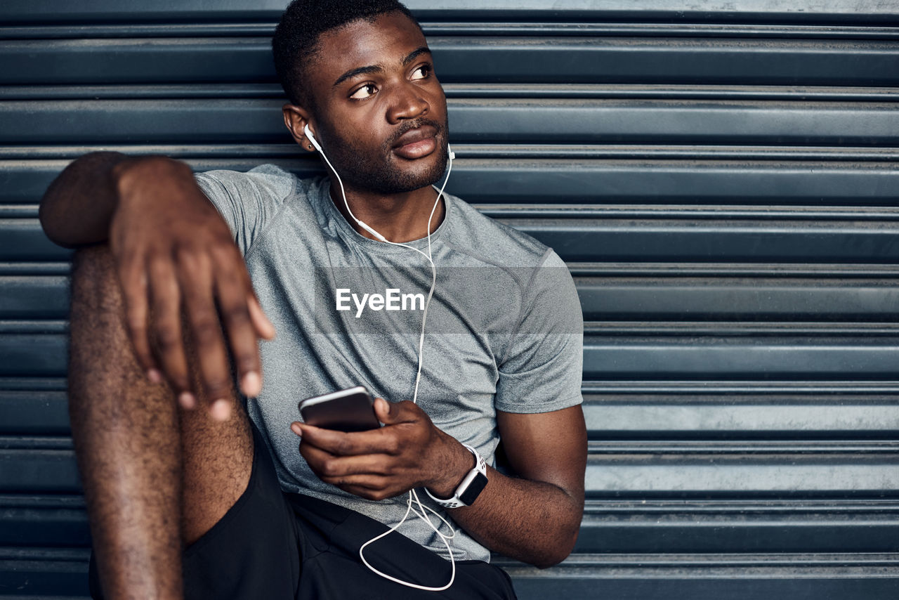 Young man using mobile phone