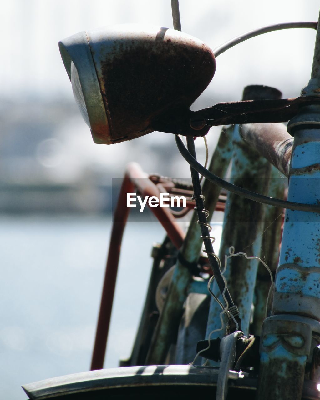 Close-up of rusty bicycle headlight