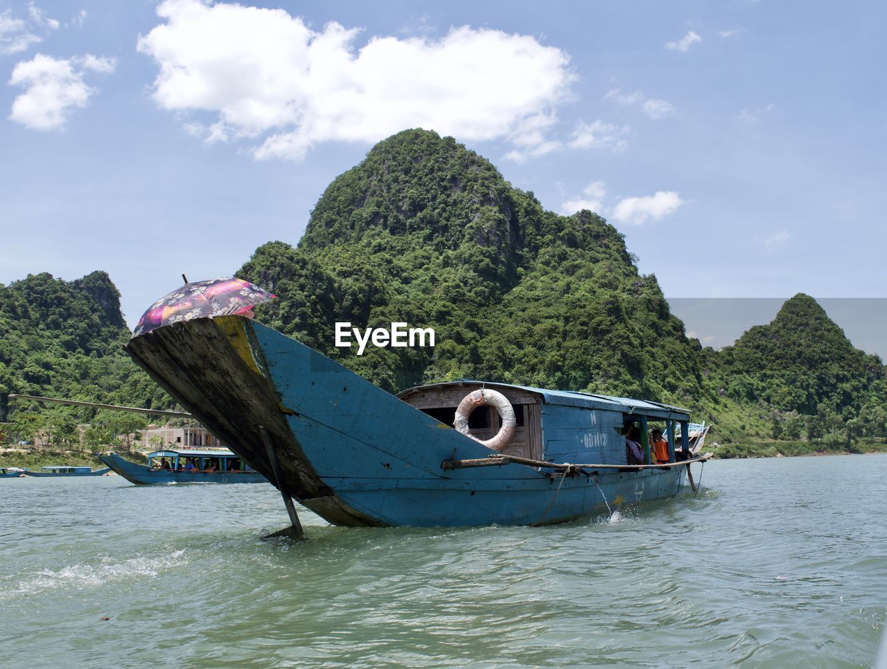 Boat in sea against sky