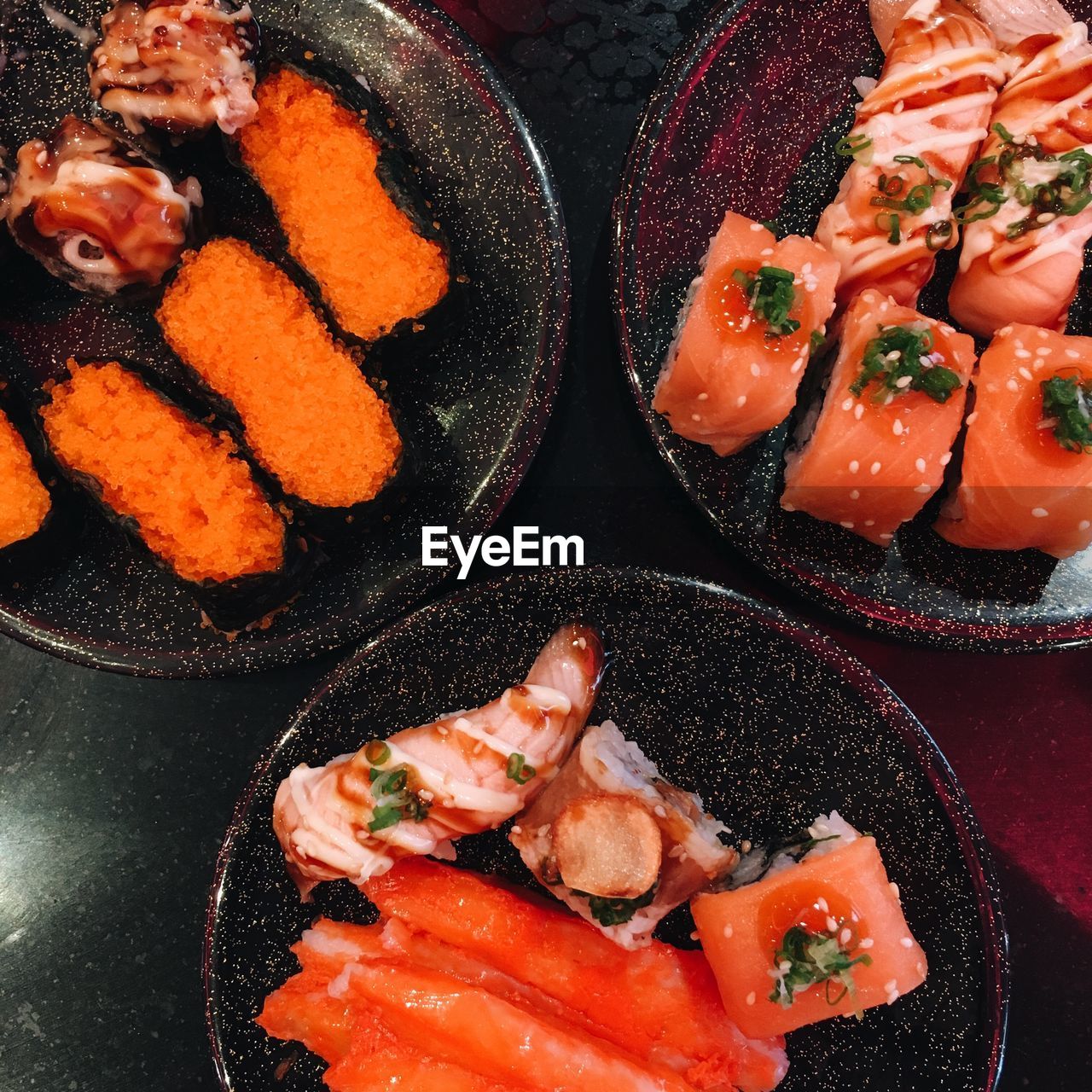 CLOSE-UP OF SUSHI SERVED ON PLATE