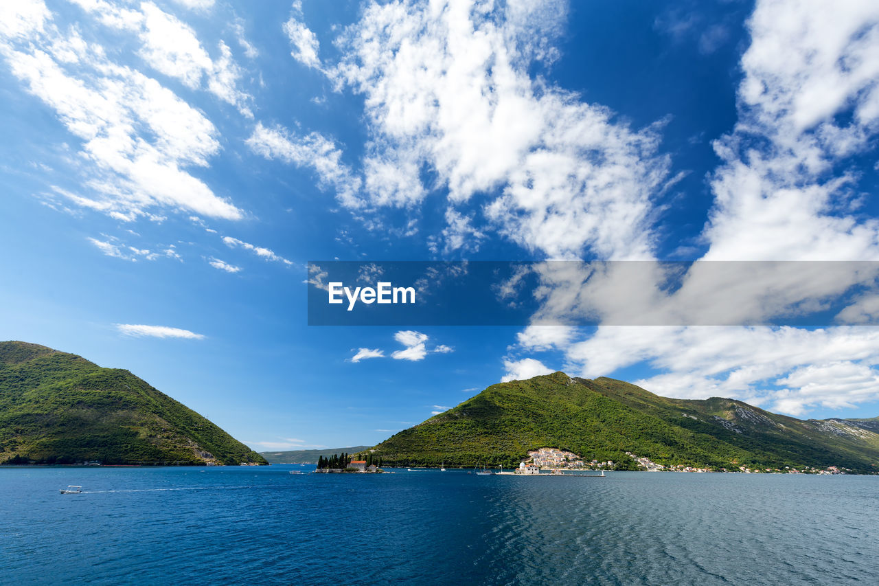 Scenic view of sea against blue sky