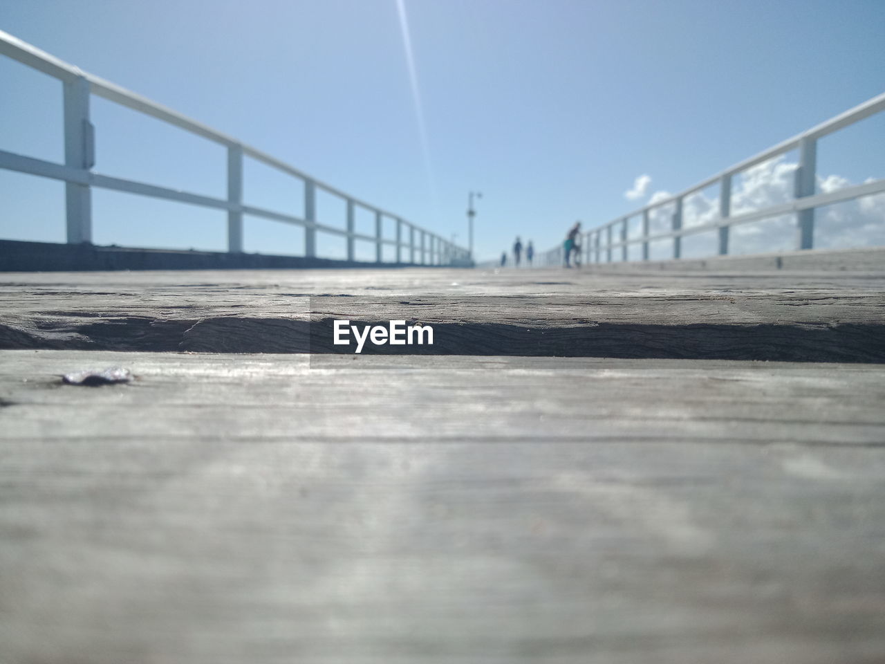 Surface level of pier against sky