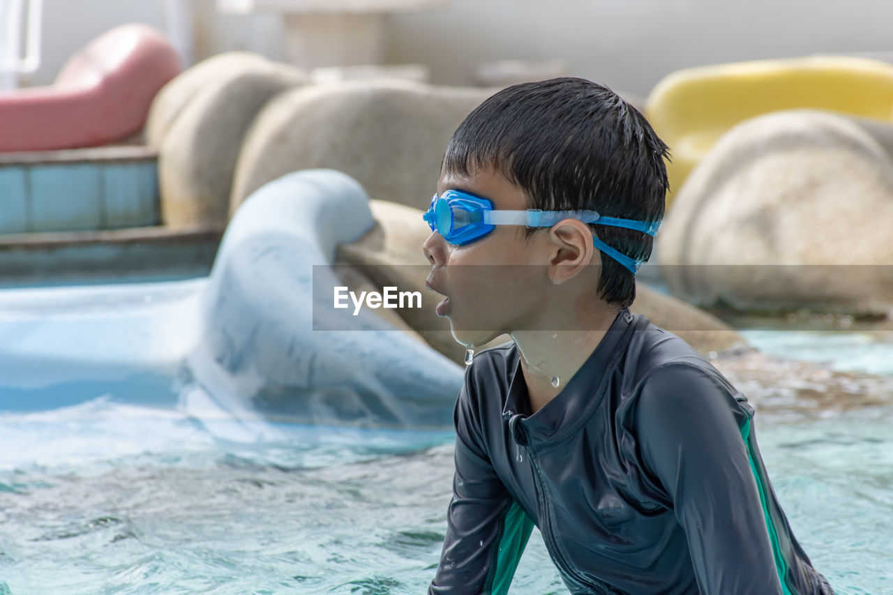 Boy in swimming pool