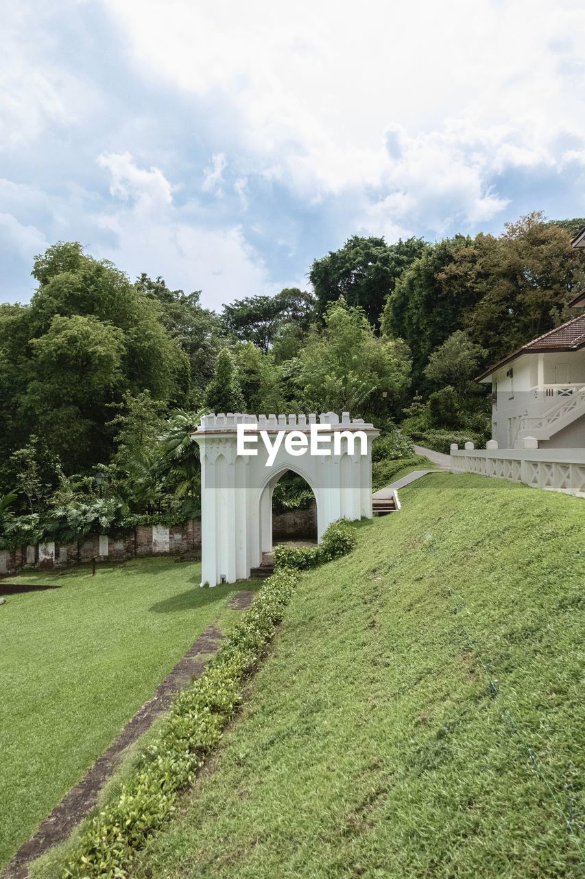 plant, architecture, built structure, tree, cloud, sky, rural area, grass, nature, green, building exterior, building, estate, no people, house, day, garden, outdoors, residential district, growth, home, landscape, mansion, land, environment, history, the past