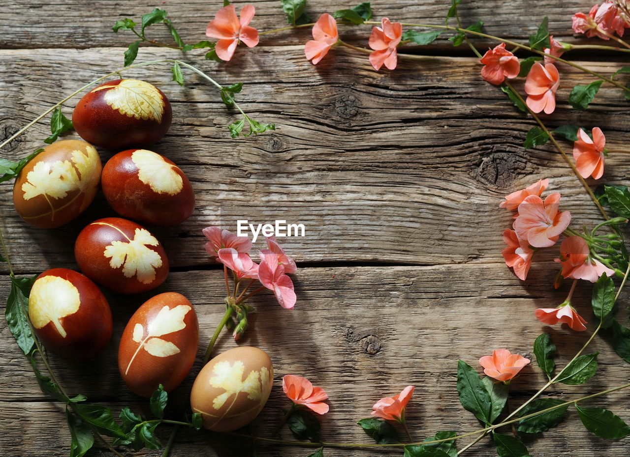 food, food and drink, wood, freshness, no people, healthy eating, plant, nature, high angle view, wellbeing, table, flower, fruit, still life, directly above, vegetable, produce, day, autumn, plant part, leaf, outdoors, tree, close-up, plank