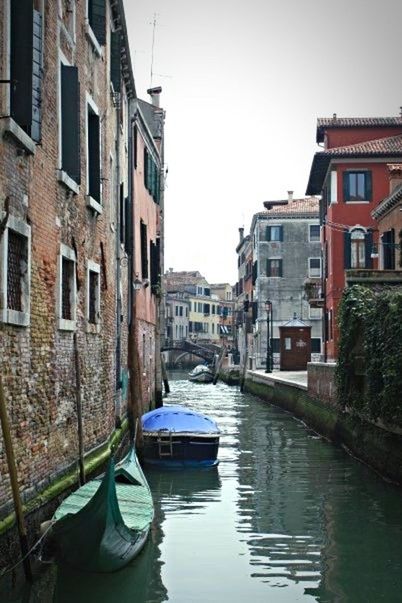 VIEW OF BOATS IN CANAL