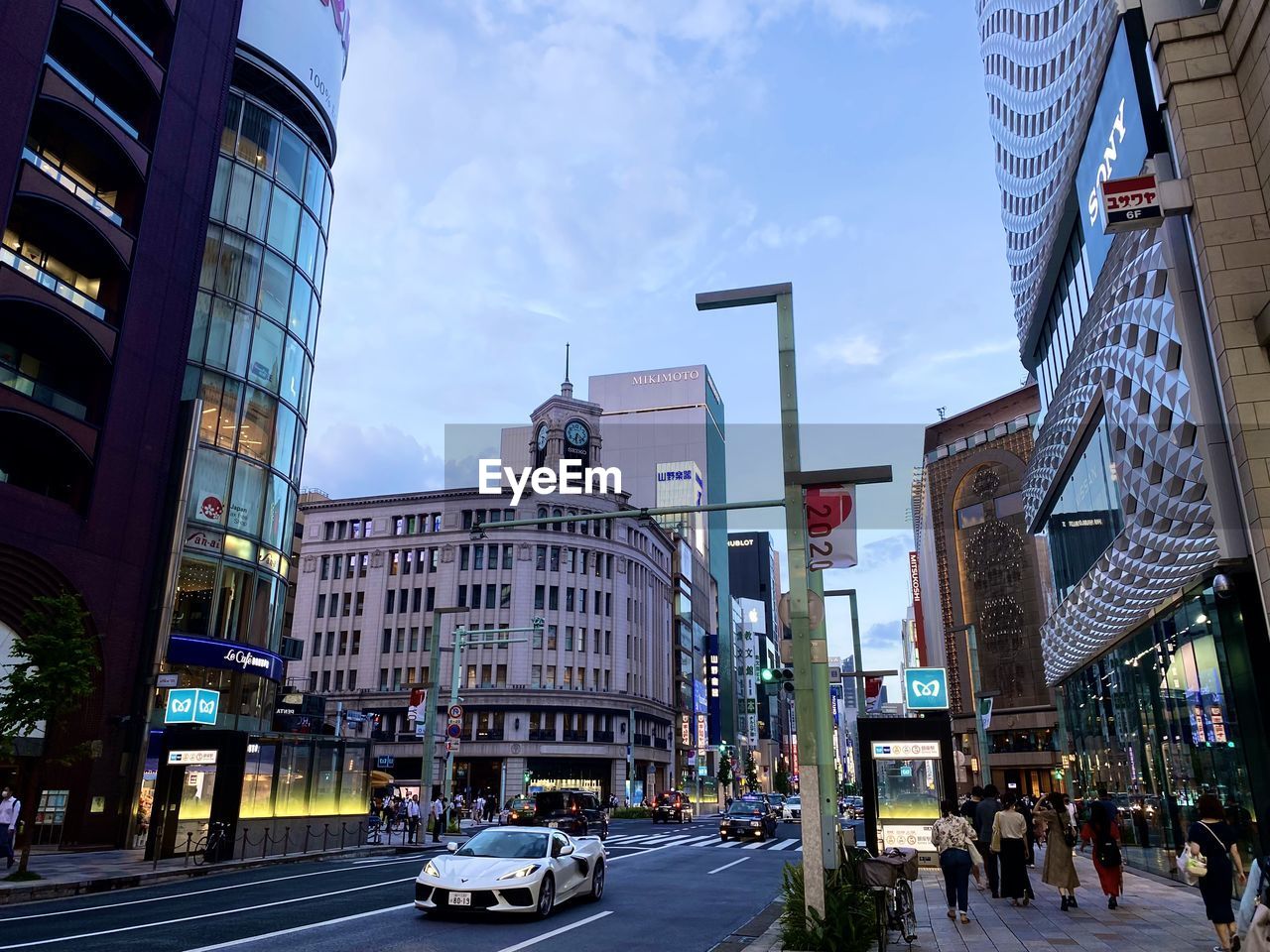 CITY STREET AND BUILDINGS AGAINST SKY