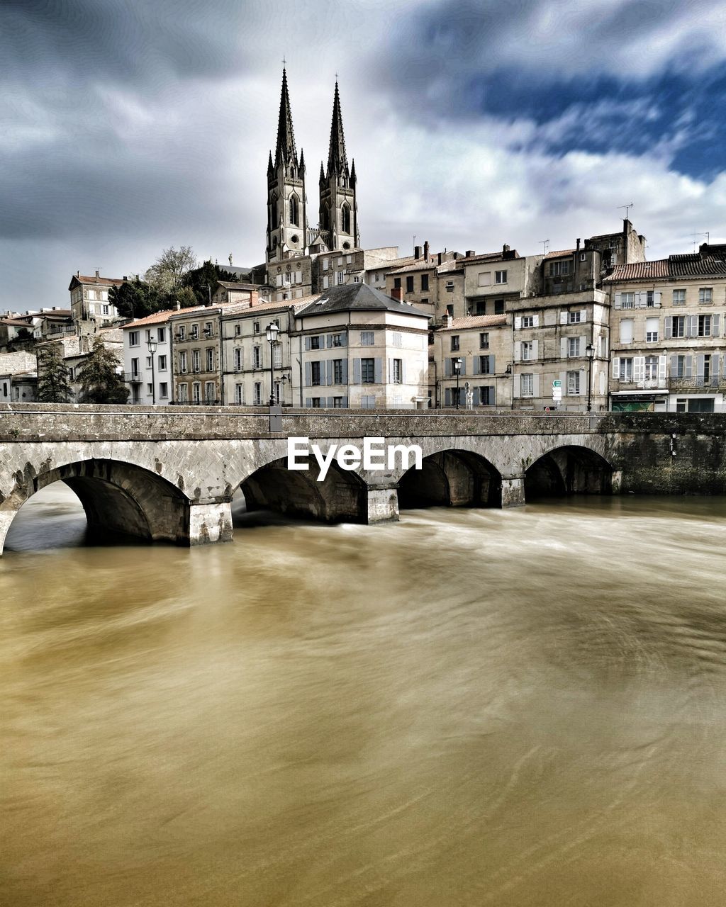 Bridge over river against sky