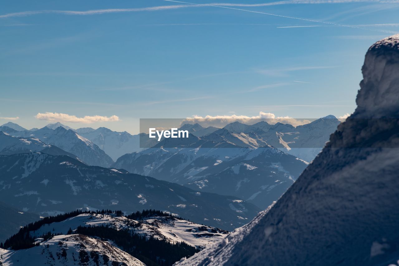 Scenic view of snowcapped mountains against sky