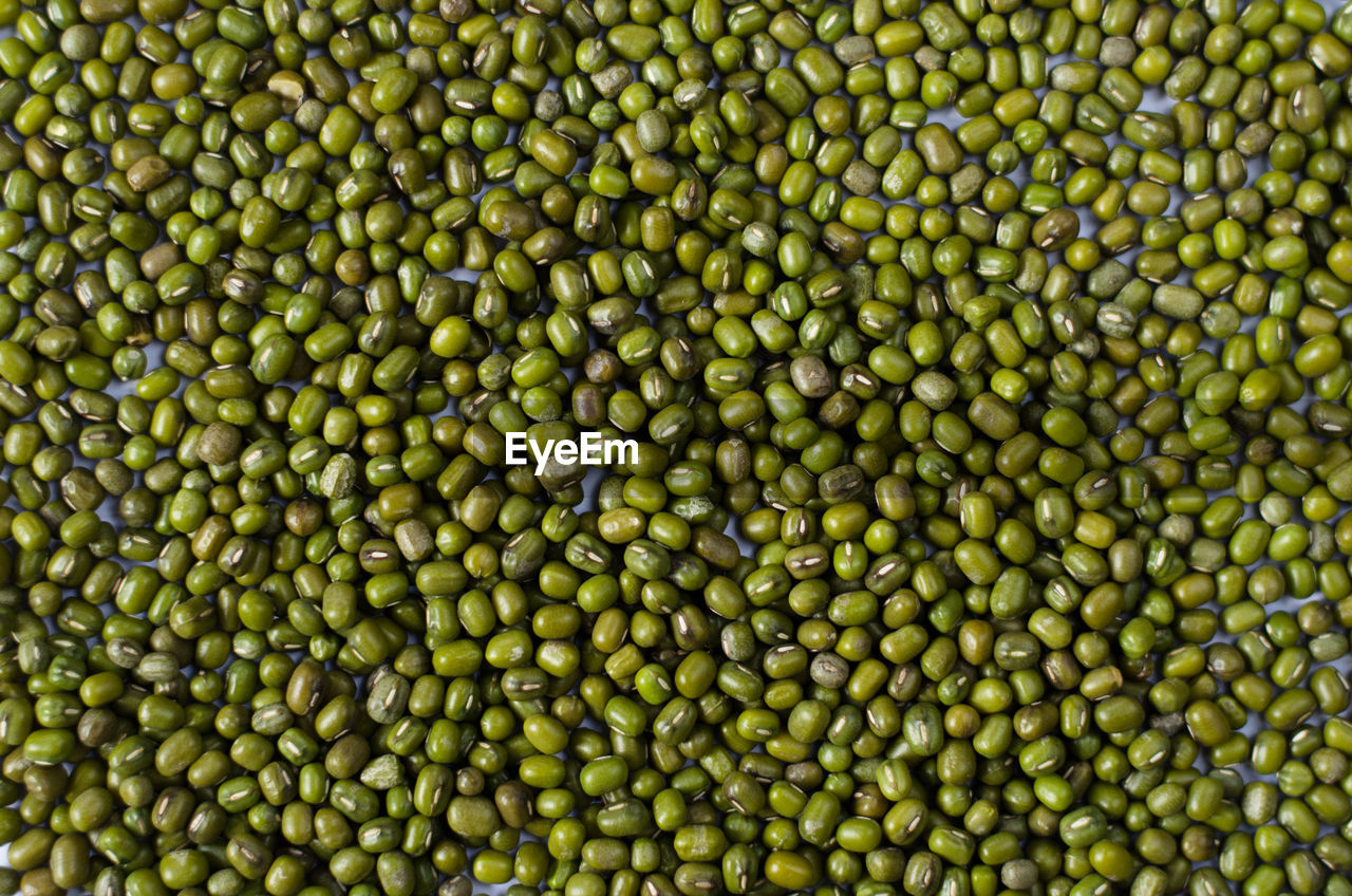 Full frame shot of green lentils on table