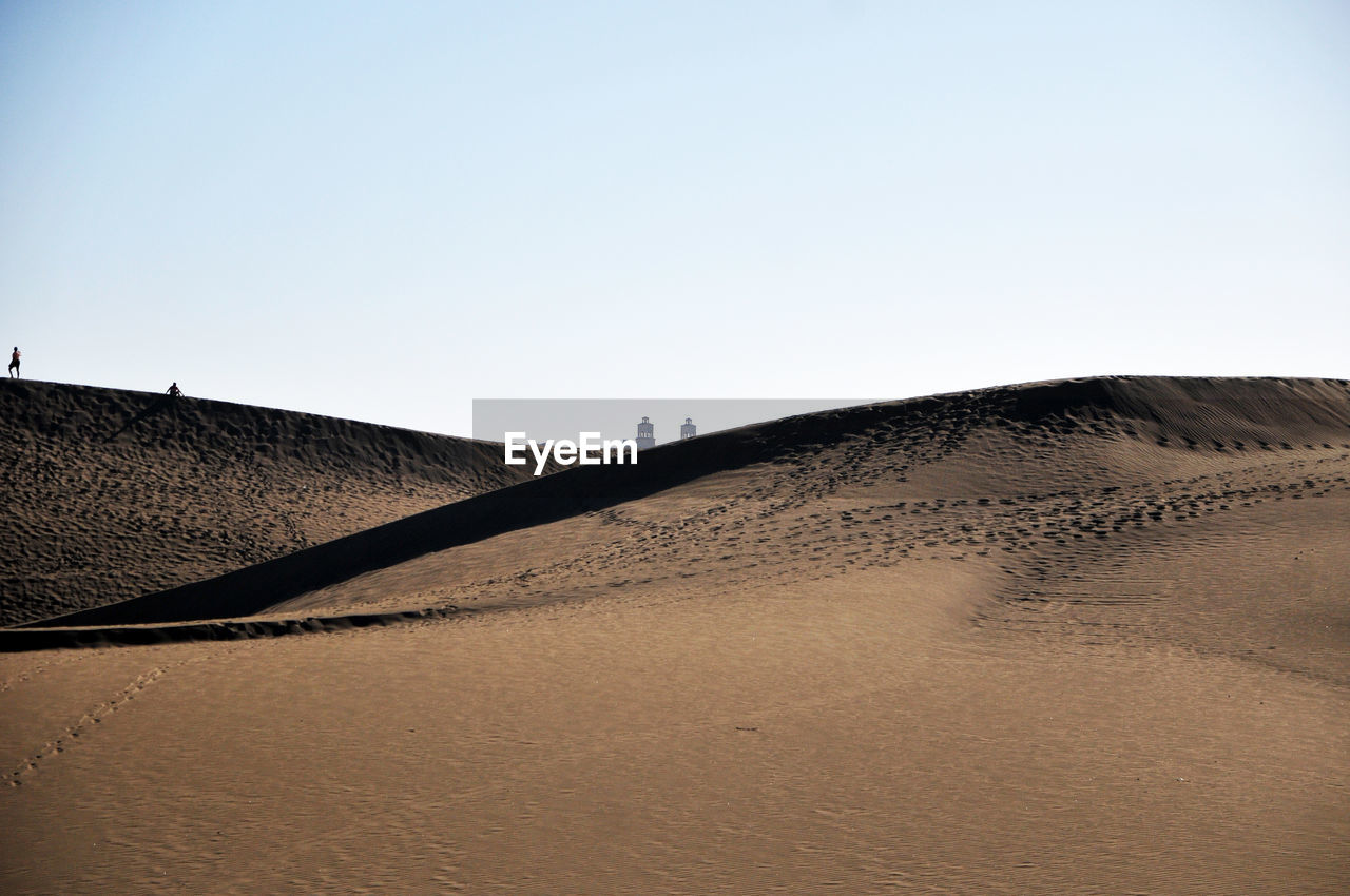 VIEW OF DESERT AGAINST CLEAR SKY