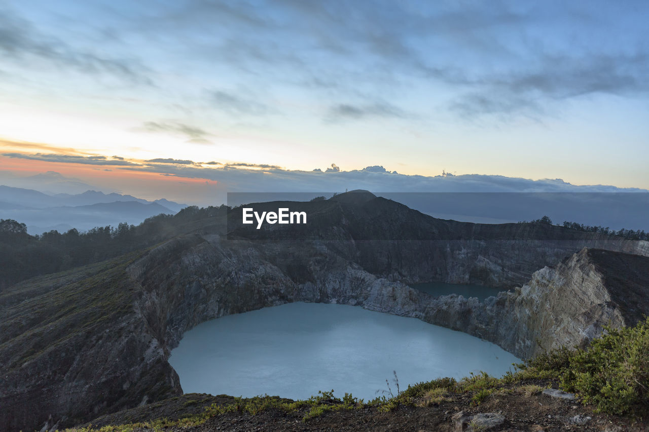 Scenic view of mountains against sky during sunset