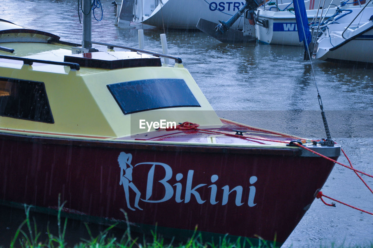 VIEW OF BOATS IN SEA