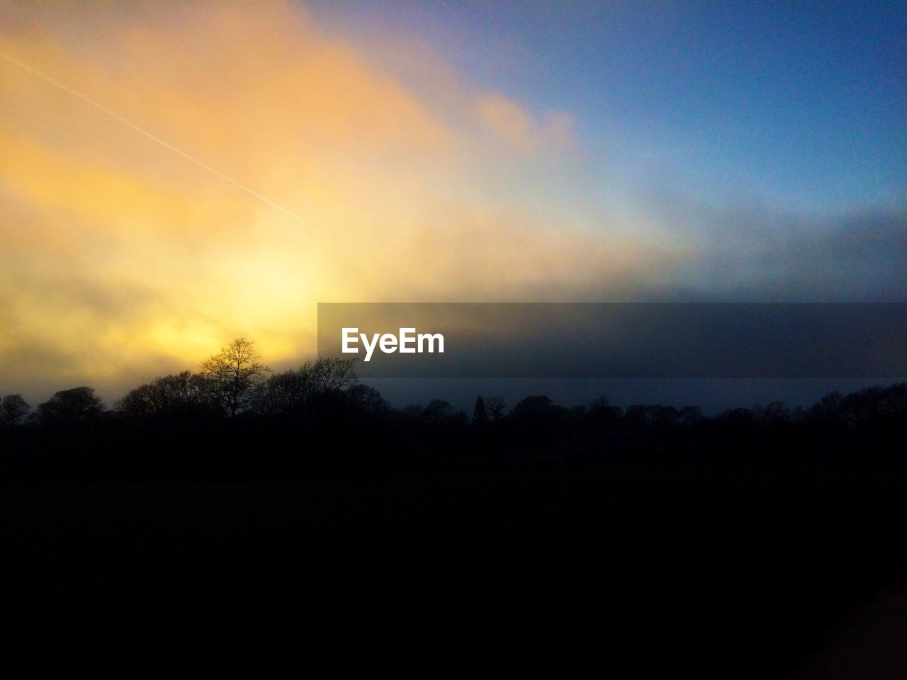 Scenic view of dramatic sky during sunset