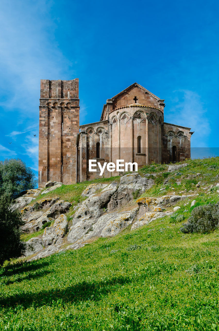 View of old building against blue sky