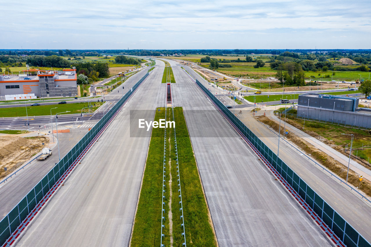 Aerial top view of road construction site. building of new city highway. drone image. new road 