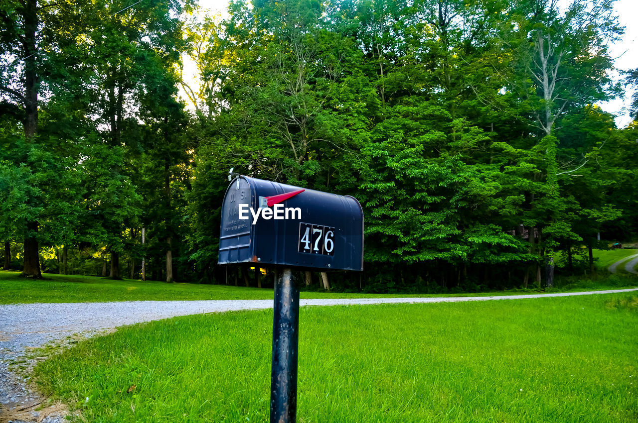 INFORMATION SIGN ON GRASS