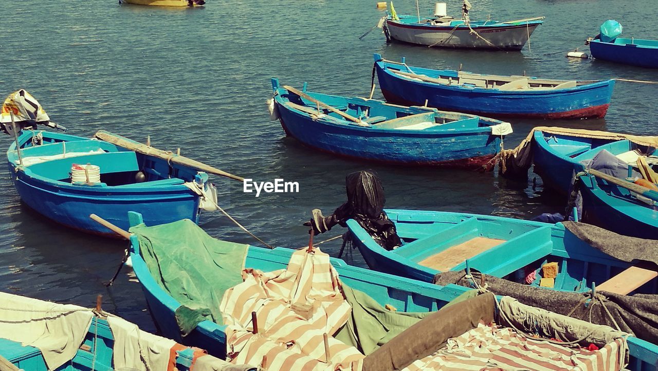 Boats moored on sea