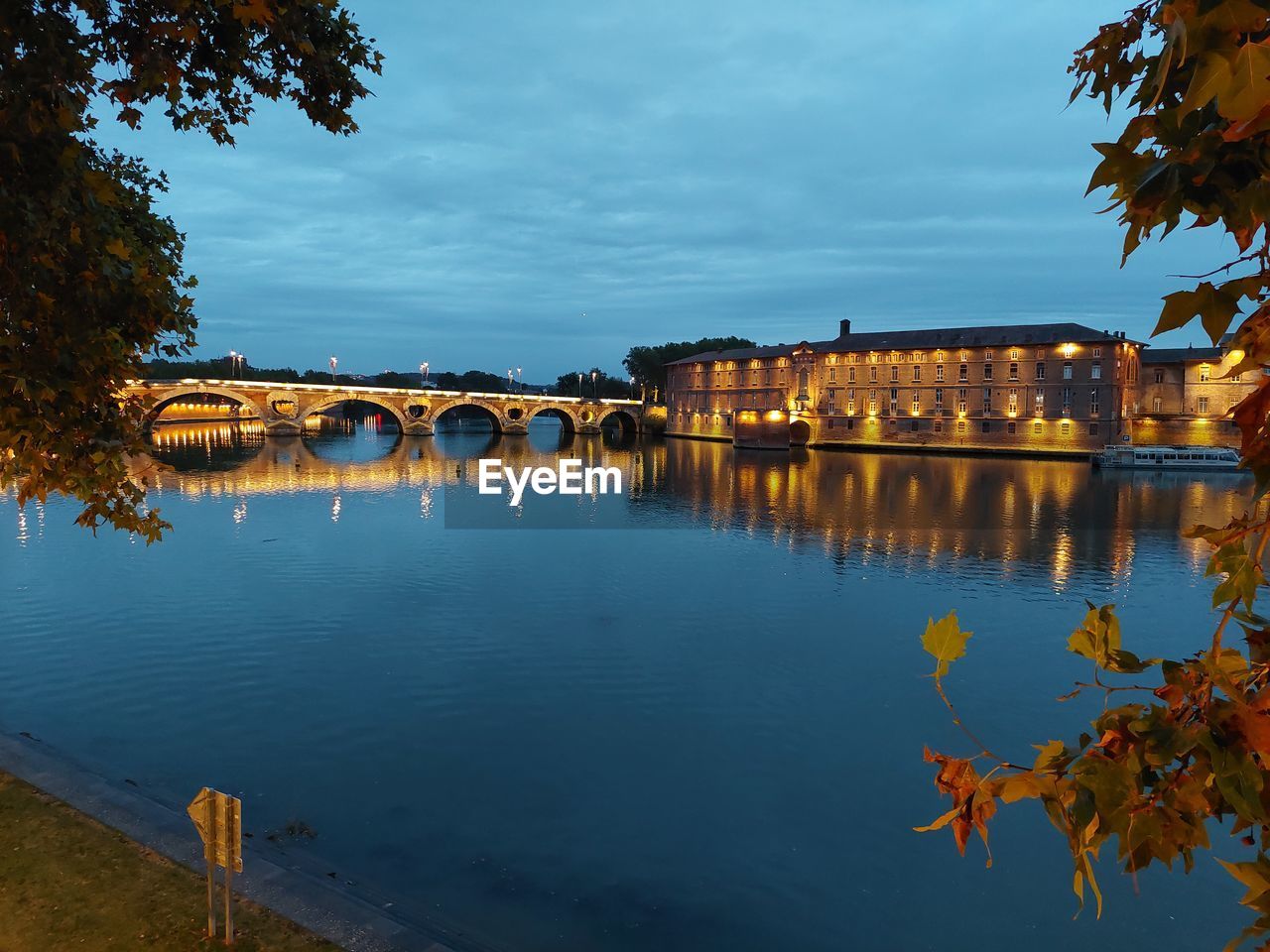 reflection, water, architecture, sky, evening, nature, autumn, built structure, dusk, tree, river, city, travel destinations, plant, building exterior, cloud, bridge, no people, sunset, beauty in nature, travel, leaf, landscape, building, outdoors, blue, tourism, body of water, tranquility, environment, scenics - nature, history, night, twilight, the past